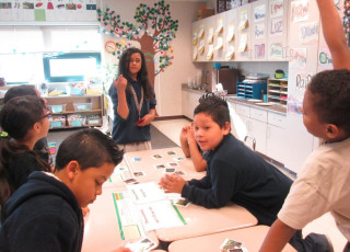 Kids working in a classroom.